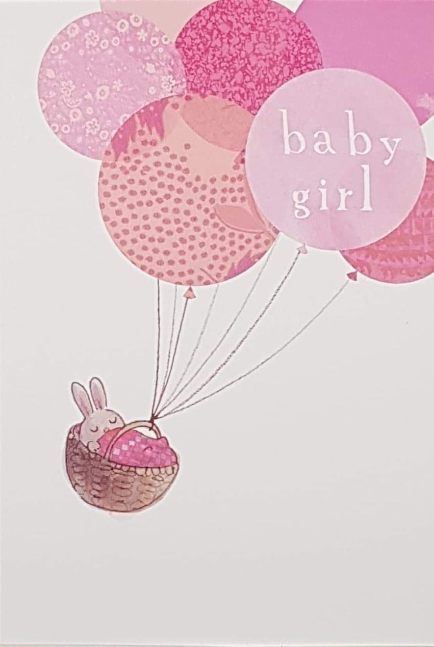 New Baby Card - Girl / A Bunch Of Pink Balloons Holding A Rabbit Sleeping In A Basket