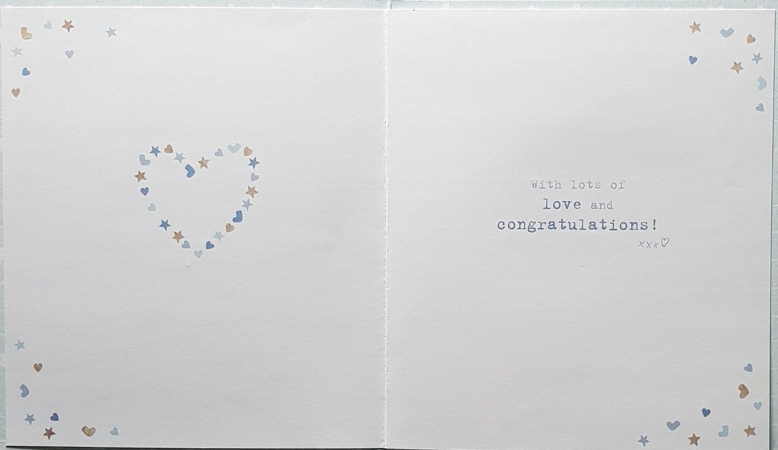 New Baby Card - Boy / Cute Dog Holding Blue Blanket Sitting In A White Circle