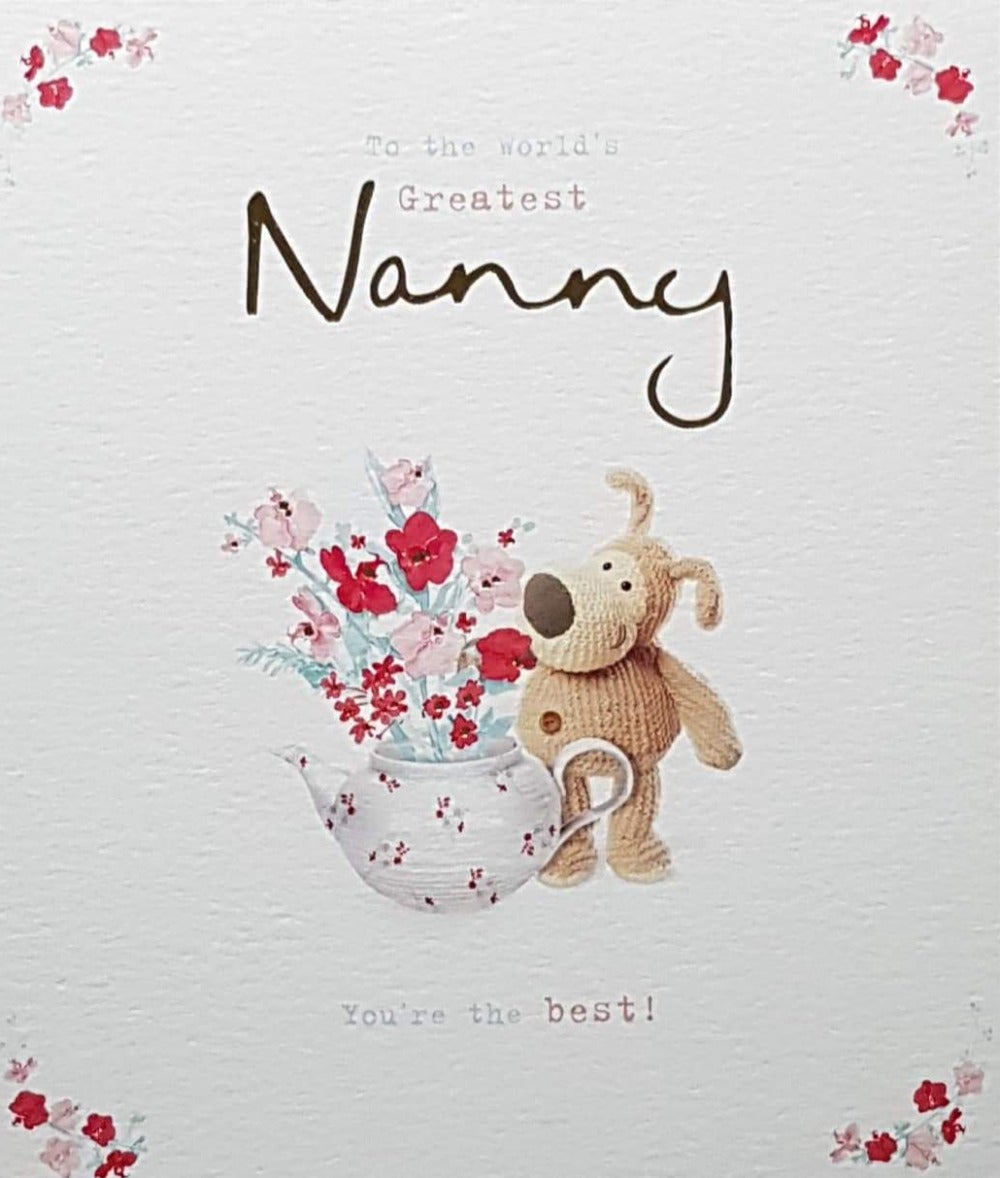 Birthday Card - Nanny / A Stuffed Dog With A Flower Bunch
