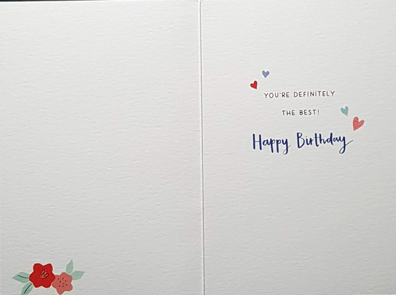 Birthday Card - Nannie / A Stuffed Dog With A Flower Bunch