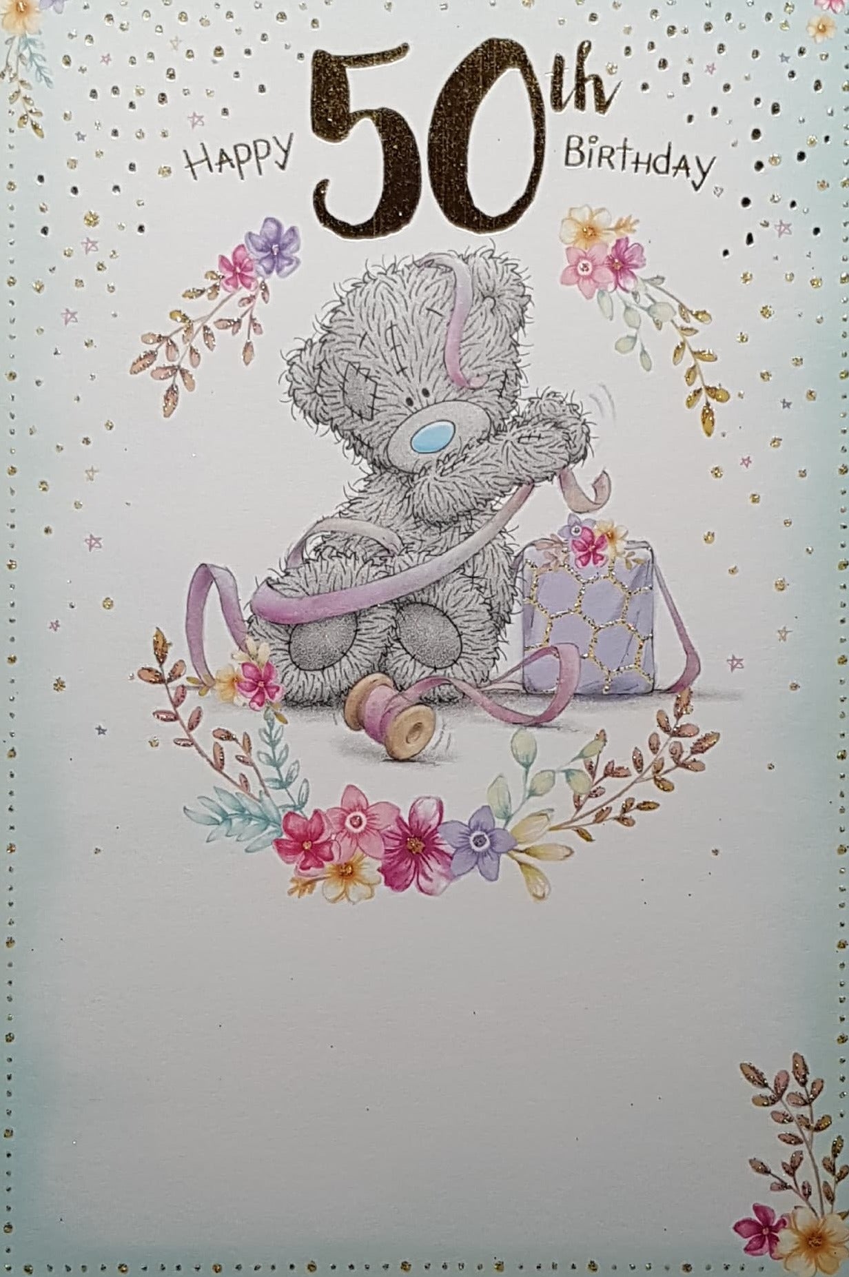 Age 50 Birthday Card - Cute Teddy Opening A Gift Tangled In A Pink Ribbon
