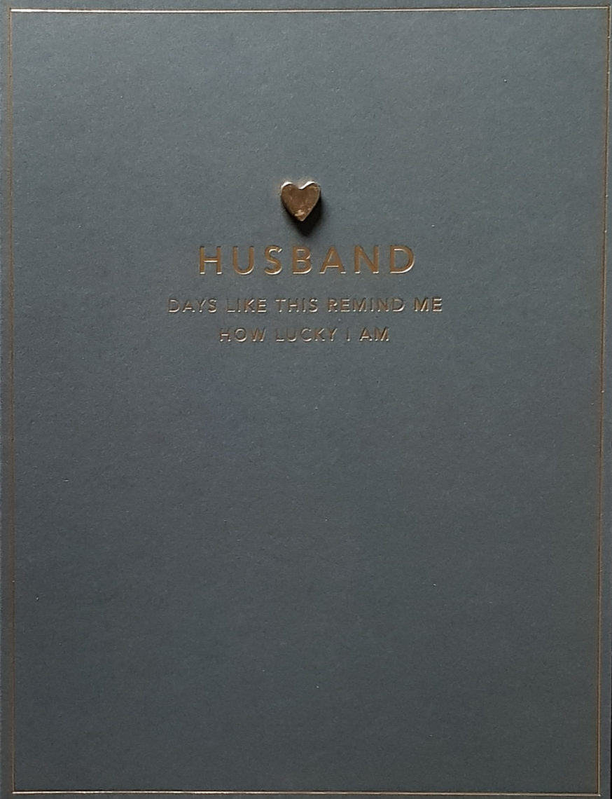 Anniversary Card - Husband / A Gold Heart & Font On A Navy Background
