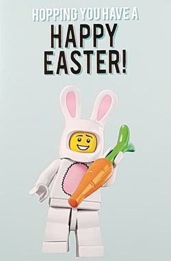 Easter Card - Yellow Toy Man In A Bunny Suit Holding A Carrot