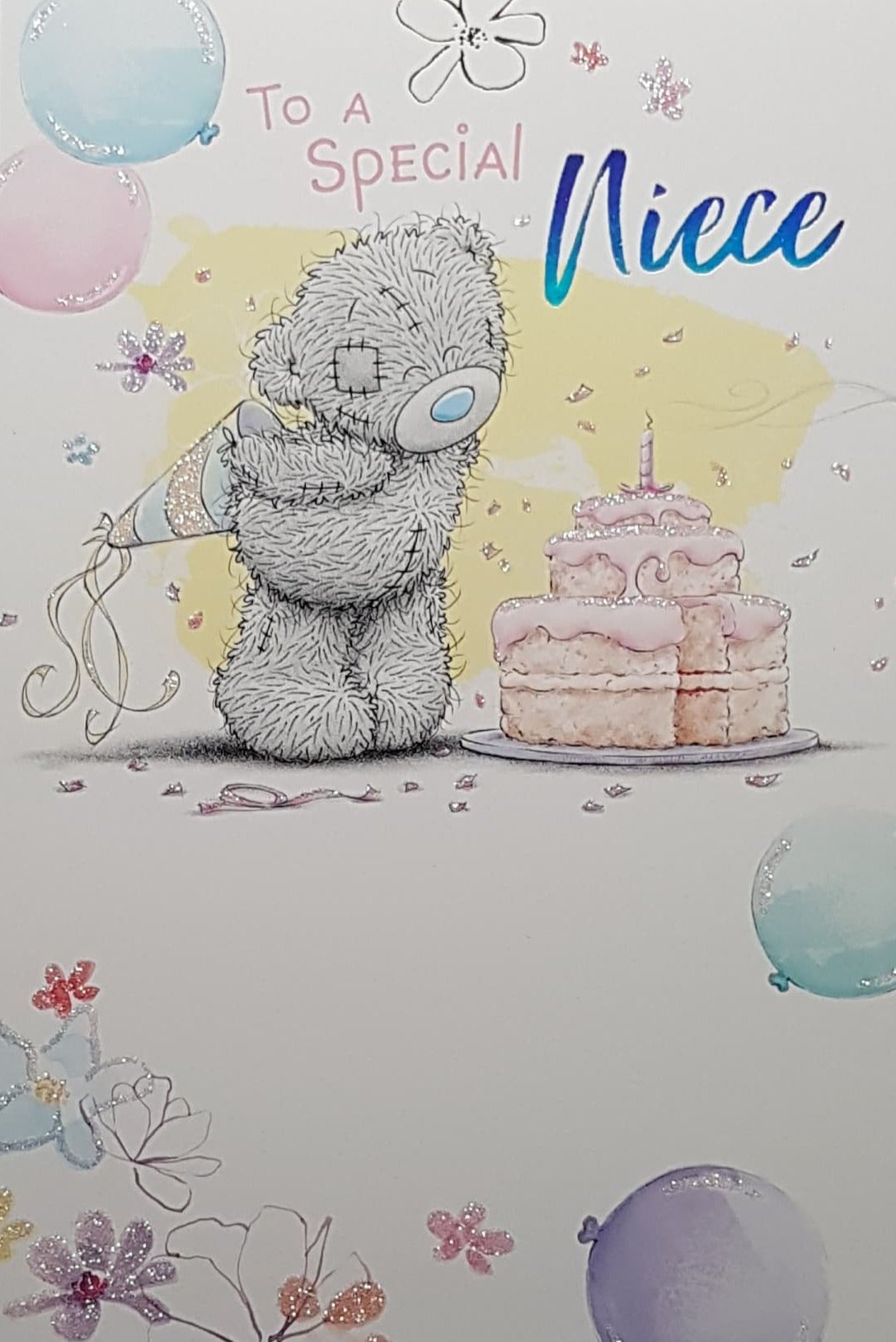Birthday Card - Niece / Teddy Holding A Party Hat Looking At A Pink Cake