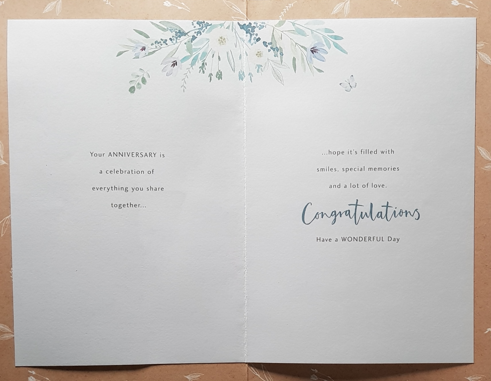 Anniversary Card - A White Floral Heart On A Gold Background