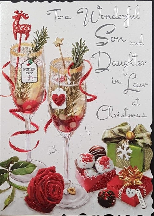 Son And Daughter In Law Christmas Card - At Christmas & Champagne Glasses, Rose & Decorations