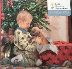 Charity Christmas Card (In Irish & English) - Pack of 8 Small Size / Irish Hospice Foundation - Child holding a dog
