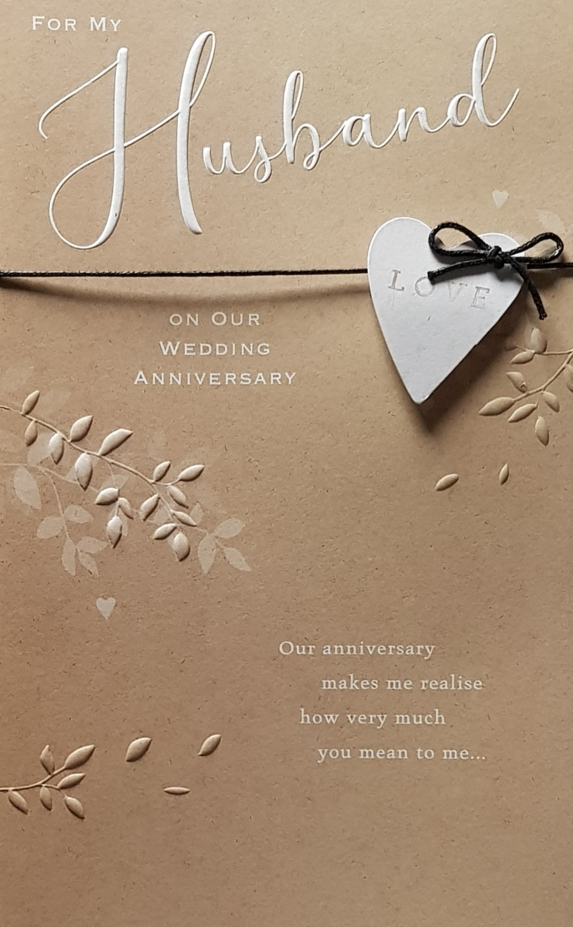Anniversary Card - Husband / A White Heart & A Black Bow On A Gold Background
