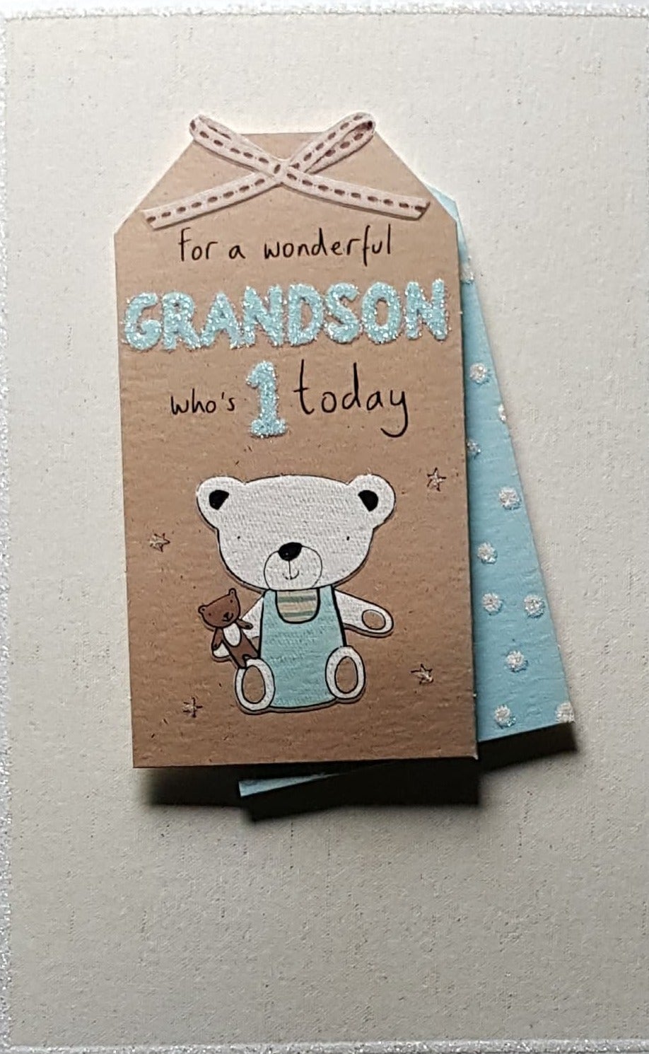 Age 1 Birthday Card - Grandson / A Teddy In A Blue Suit & A Shiny Blue '1'