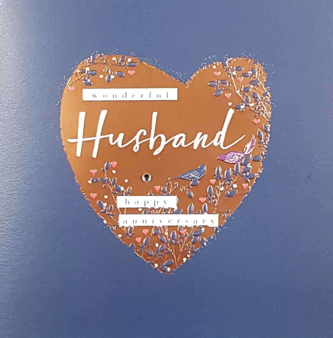 Anniversary Card - Husband / A Gold Heart On A Blue Background