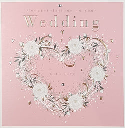 Wedding Card - General / A White Floral Heart On A Pink Background